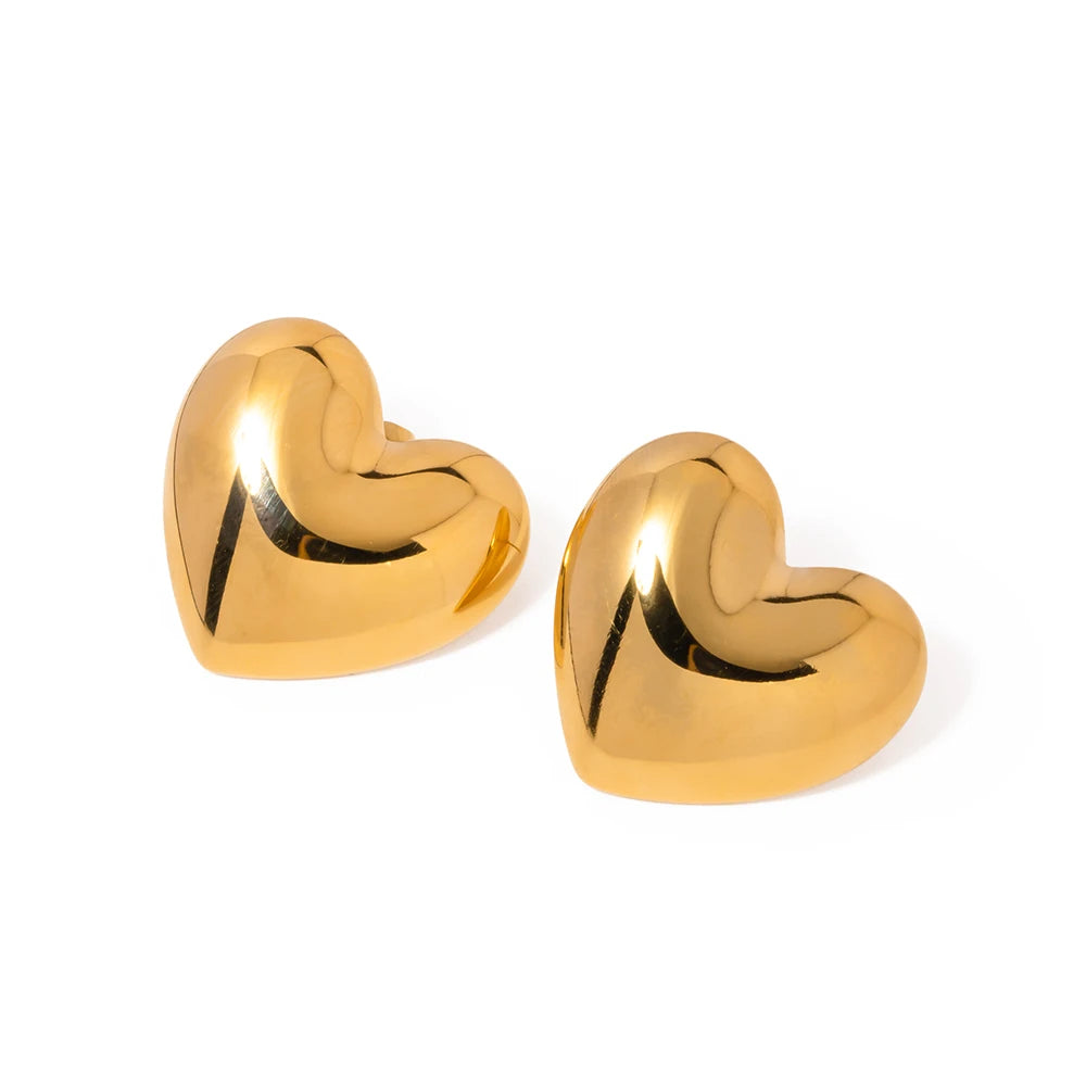 A pair of heart-shaped stud earrings made with stainless steel and 18k PVD gold plating.