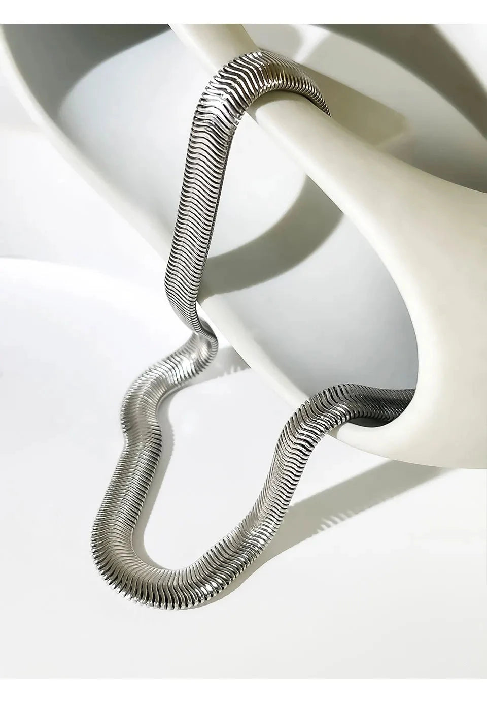 Fashion jewelry silver herring bone necklace. Tarnish-free and waterproof