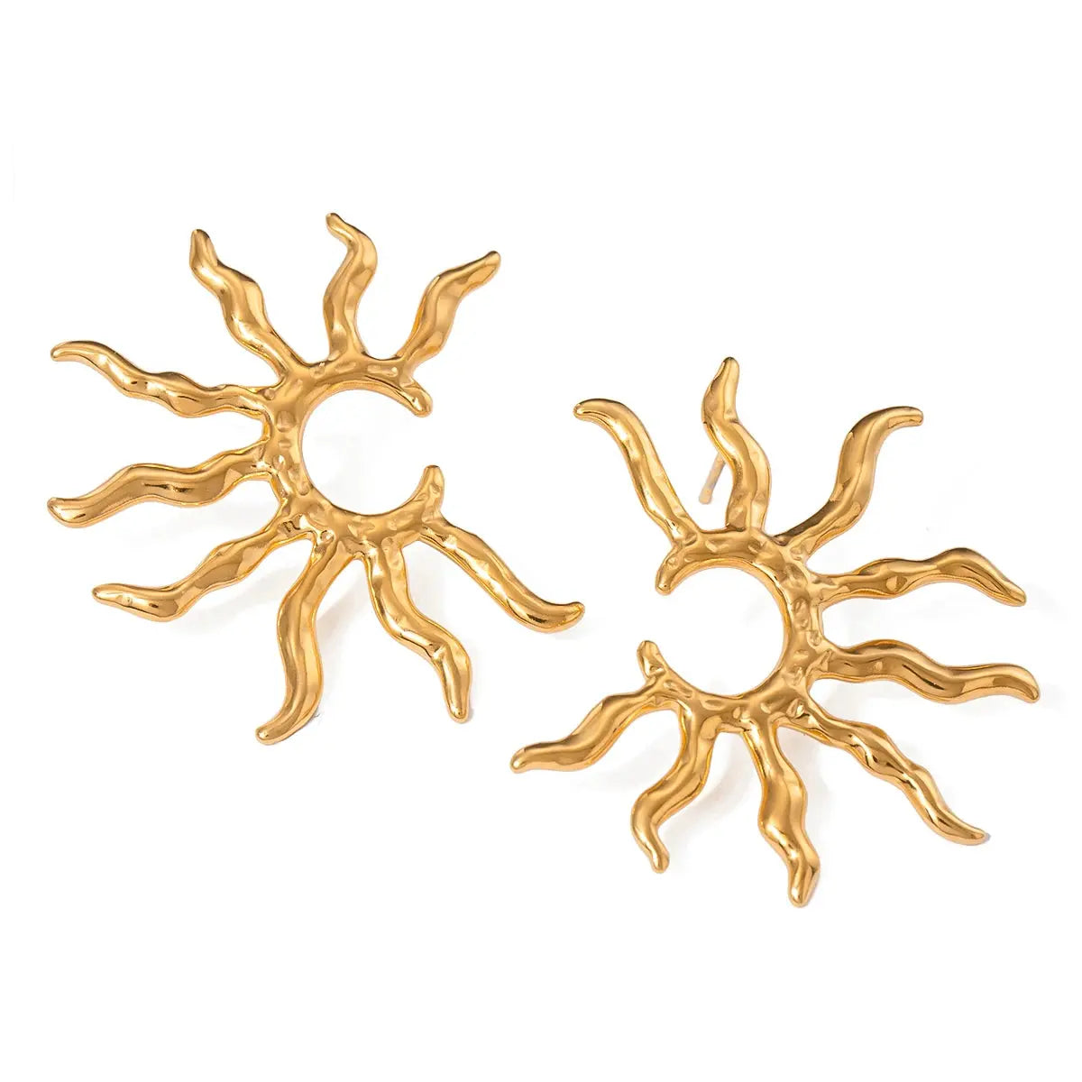 Pair of gold sun-shaped earrings on a white background
