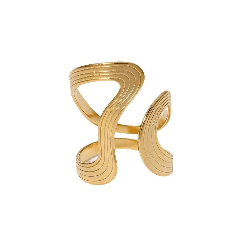 Lucilla Exotic Ring in Gold, a bold spiral design on a clean white background. 18K gold-plated stainless steel.