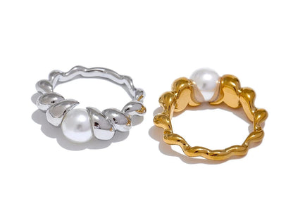 The Mika Twisted Pearl Ring displayed in a silver-toned finish (stainless steel), highlighting the color options.