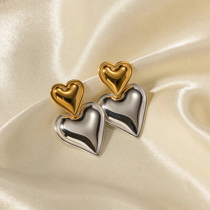 Close-up of Mixed Metal Heart Drop Earrings texture and finish – 18K gold plating over stainless steel