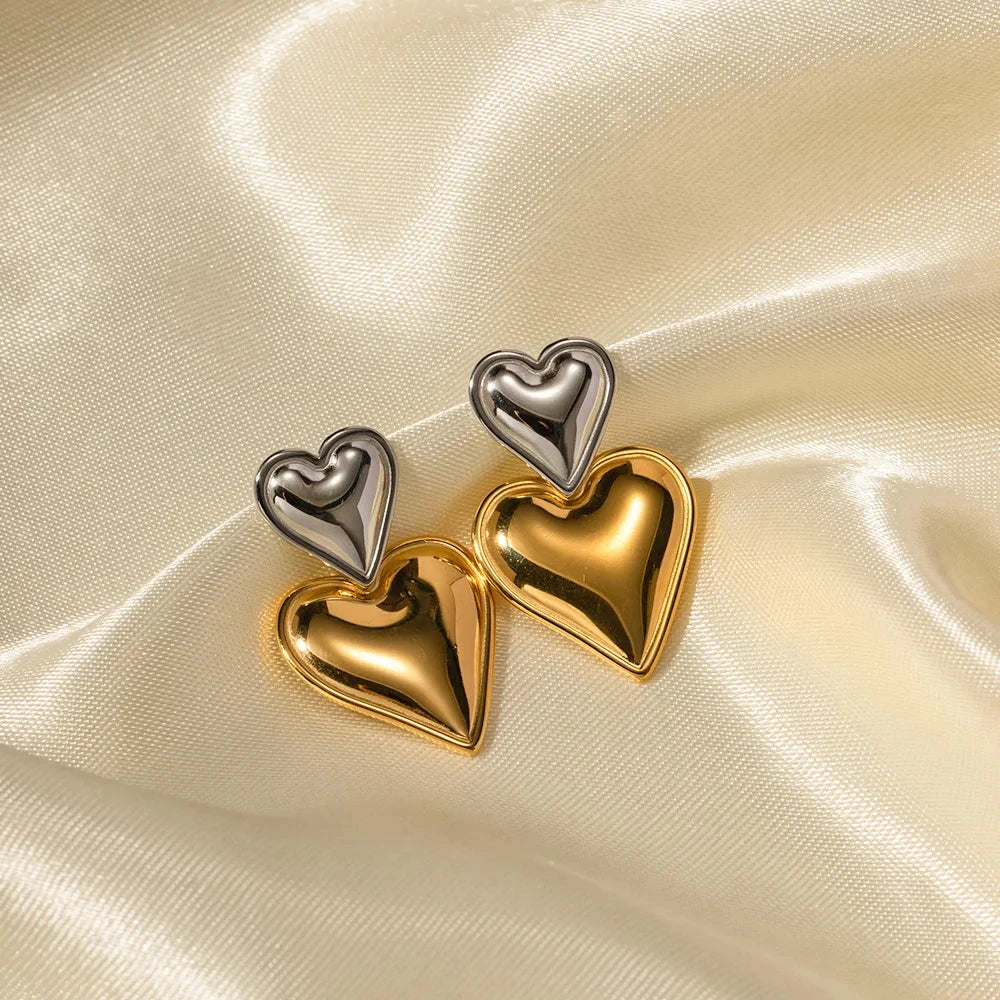 Side view of Mixed Metal Heart Drop Earrings showing drop length and dual-metal heart design