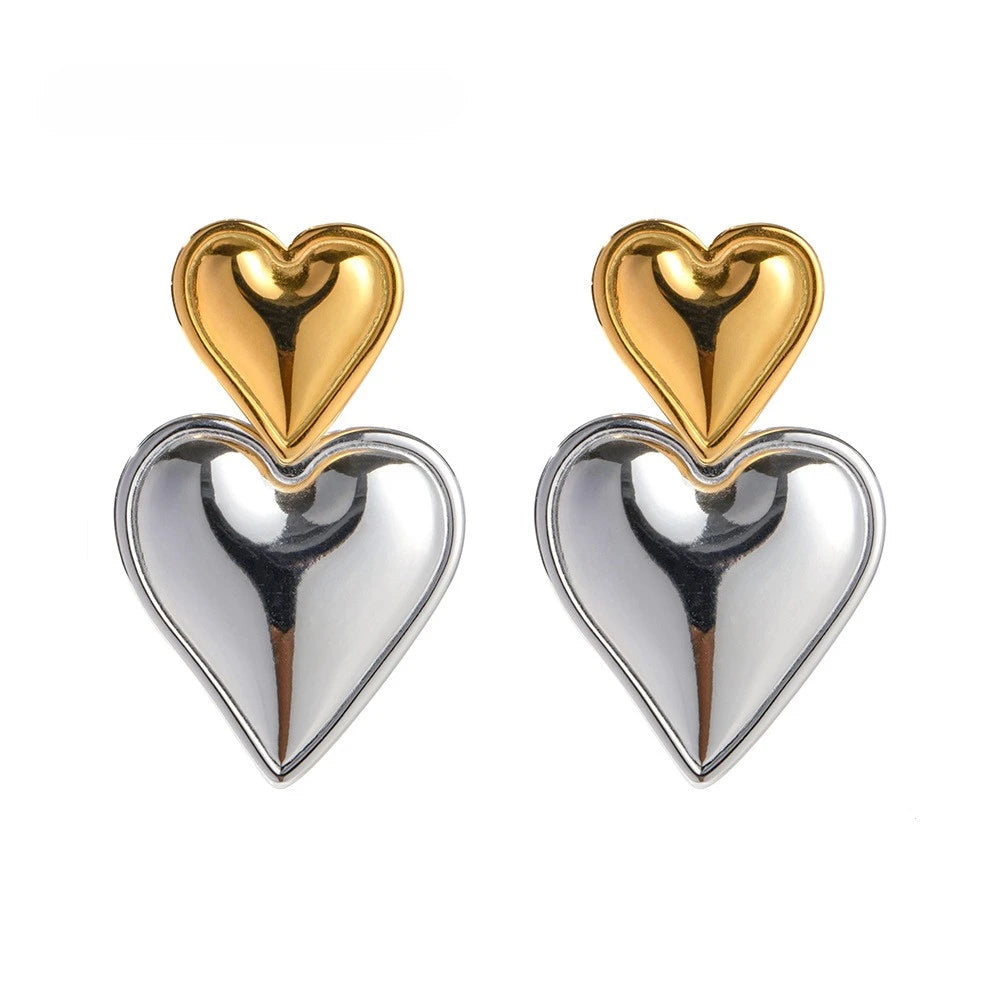 Mixed Metal Heart Drop Earrings front view – gold-plated and silver-tone hearts hanging on push-back posts”