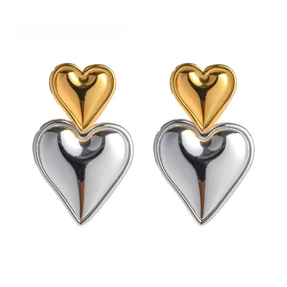 Mixed Metal Heart Drop Earrings front view – gold-plated and silver-tone hearts hanging on push-back posts”