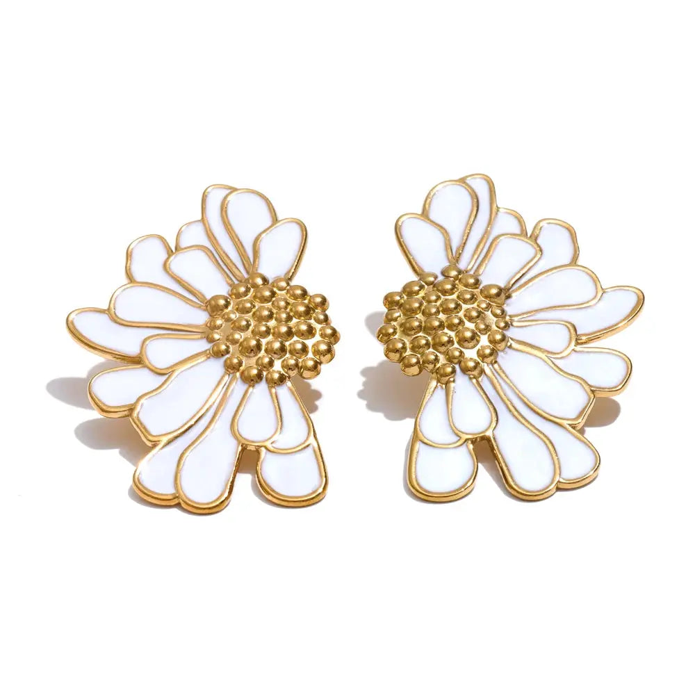 18K PVD Gold-Plated Sunflower statement earrings with white enamel petals, featuring a push-back closure.