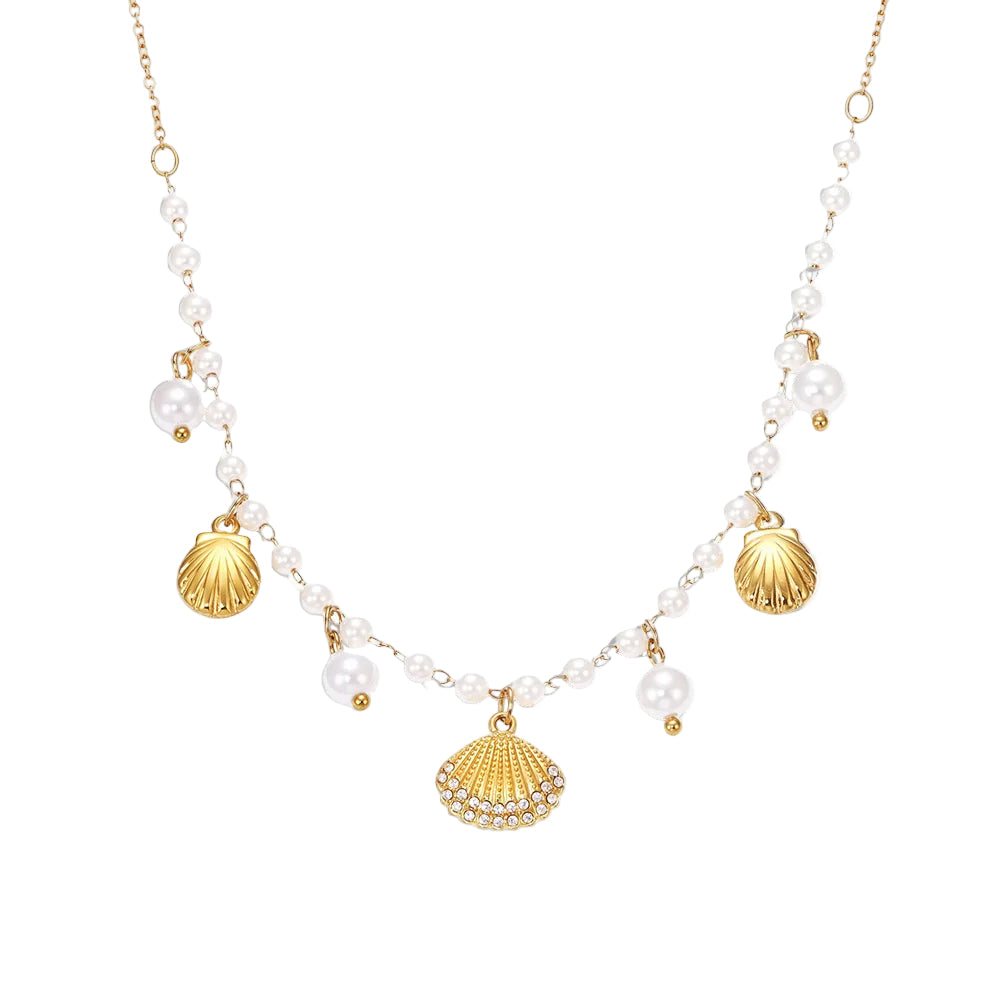 Necklace with gold shell pendants and white beads on a white background, featuring the Inti Jewelry brand.