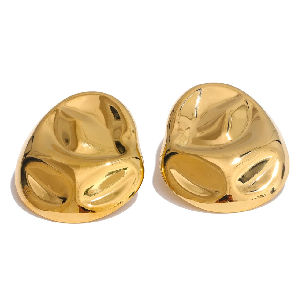 A pair of gold-colored stainless steel geometric stud earrings displayed against a white background.