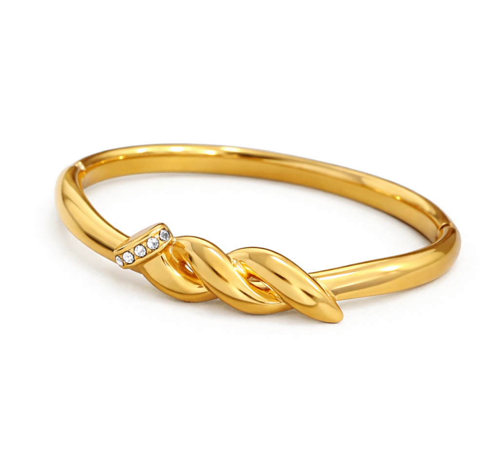 18k PVD gold-plated bangle with a knot design on a white background