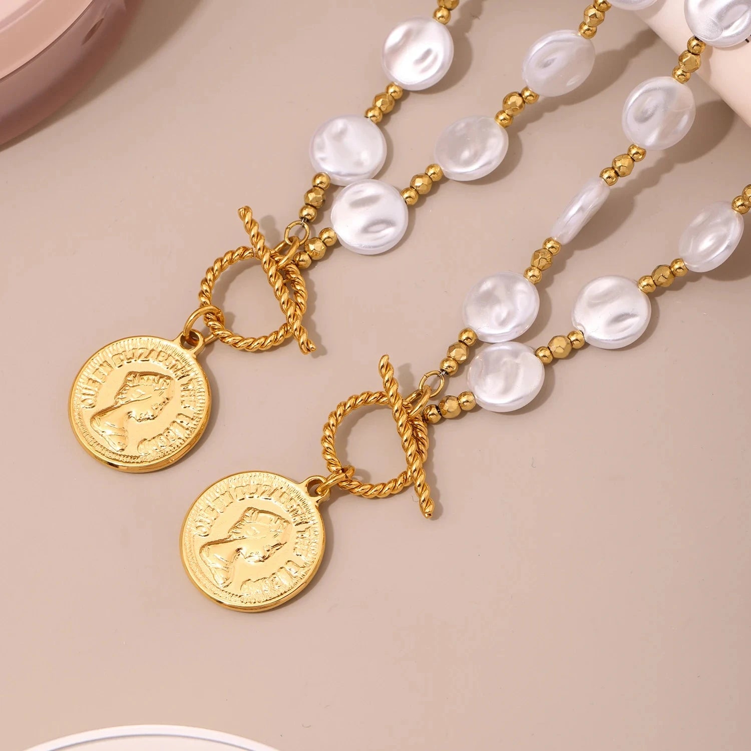 Side view of Vintage Pearl Beaded Necklace showing toggle clasp and pearl strand design. 