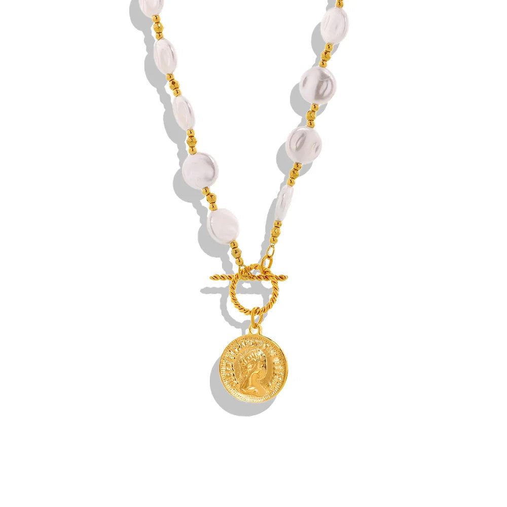 Necklace with white beads and gold chain featuring a pendant on a white background, branded 